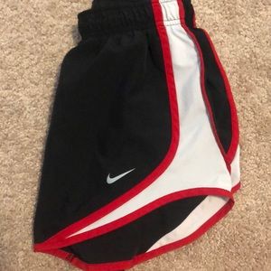 Black Nike running shorts
